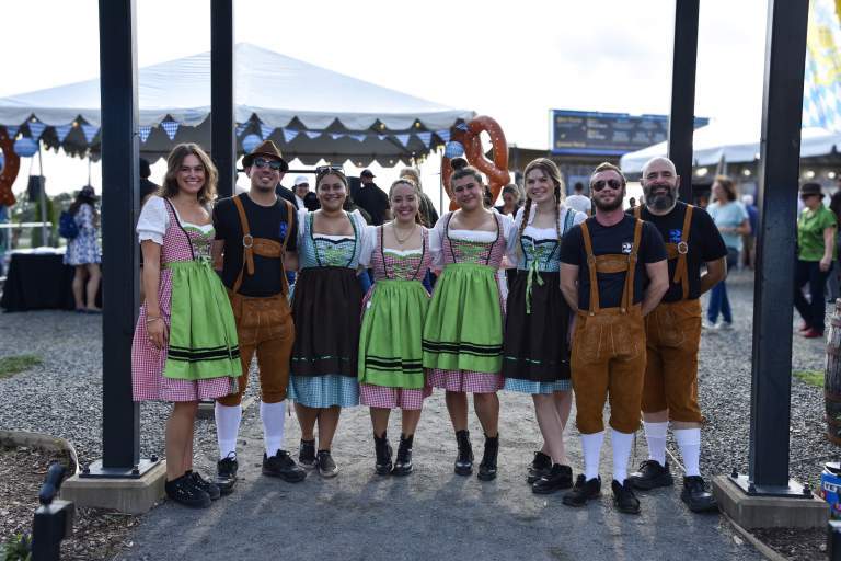 The team at 2 Silos going all in with German dress - lederhosen and dirndl - at Oktoberfest last year!